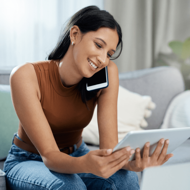 woman happily setting up appointment for kitchen renovation consultation